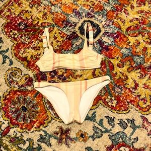 An amazingly cute cheeky bikini size S! With a clip in the back of the top!!!